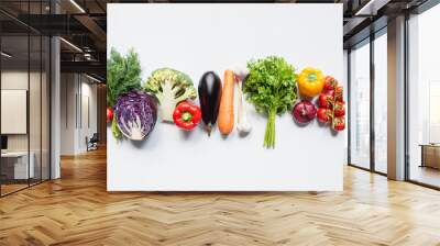 top view of colorful assorted fresh vegetables in line on white background Wall mural