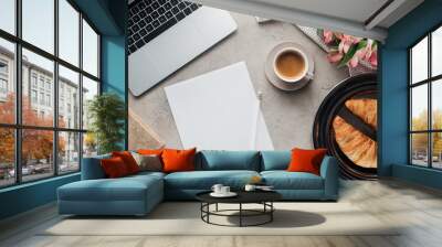 top view of cup of coffee with blank paper, croissants and laptop on concrete surface Wall mural