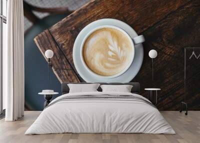 top view of cup of fresh coffee on rustic wooden table Wall mural