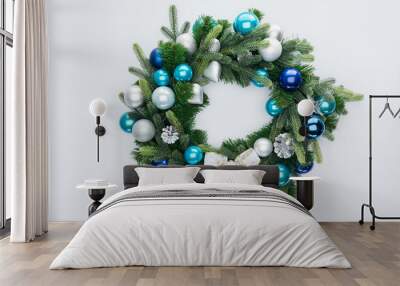 Top view of decorative festive wreath with blue and silver Christmas toys isolated on white Wall mural