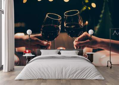 women clinking glasses over served table Wall mural