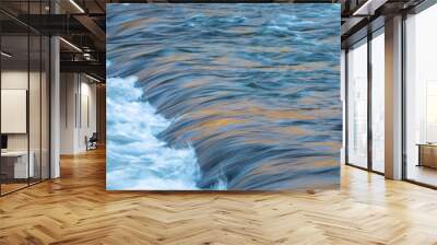 Water concept - river water flowing with light reflecting of its surface - long exposure shot Wall mural