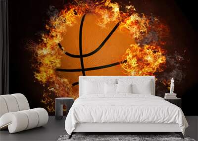 Basketball on hot fire smoke with black background Wall mural