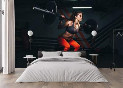 fitness woman lifting weight Wall mural