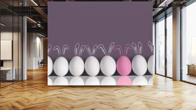 Pink bunny among white rabbits as Easter eggs Wall mural