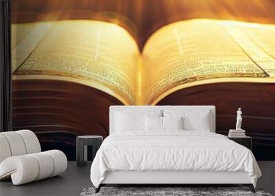 A close-up of a beautifully illuminated Bible open to Psalms, its gold-gilded pages radiating warmth and reverence. Wall mural