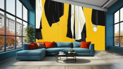 An abstract representation of a Catholic nun's habits, hung on a line, with the traditional black and white hues contrasting against a bright yellow background. Wall mural