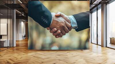 Businessman handshake for teamwork of business merger and acquisition,successful negotiate,hand shake,two businessman shake hand with partner to celebration partnership and business deal Wall mural