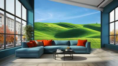 Emerald Green Hills of Tuscany: The rolling emerald green hills of Italy's Tuscany region provide a breathtaking view against the bright blue sky. This serene landscape evokes feelings of peace Wall mural