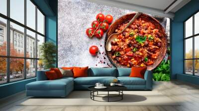 Chili con carne - minced meat stew with red bean and tomato.Traditional dish of mexican cuisine.Top view with copy space. Wall mural