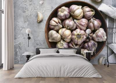 Garlic in a clay bowl .Top view.Space for text. Wall mural