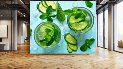 Summer refreshing drink with cucumber and mint. Top view with copy space. Wall mural