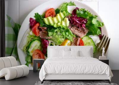 Tuna salad with fresh vegetables . Top view with copy space. Wall mural