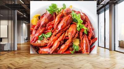 A large bowl of bright red delicious braised crayfish on a white background Wall mural