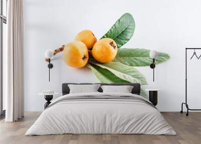 Fresh loquat fruit on white background Wall mural