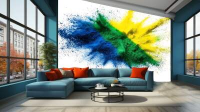 Colorful powder particles explosion in brazilian flag colors isolated on white background. Bright blue, yellow, green color burst Wall mural