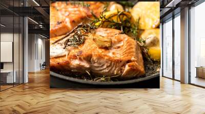 Grilled salmon fish with herbs, garlic and lemon Wall mural