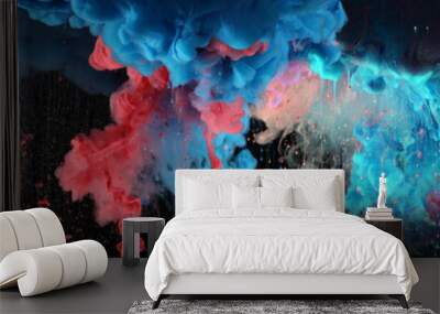 Acrylic blue and red colors in water. Ink blot. Abstract black background. Wall mural