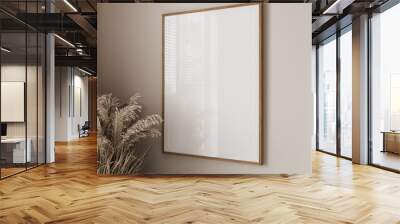 blank frame on beige wall mock up, vertical wooden poster frame on wall, mock up for picture or photo frame, empty frame on bright wall with dried plants, 3d render Wall mural