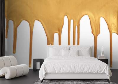 Gold and bronze glitter color flow liquid painting on white background. Wall mural