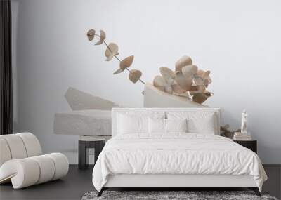 Stack stones platform podium and eucalyptus leaf twig on gray light copy spase background. Minimal empty display product presentation scene. Wall mural