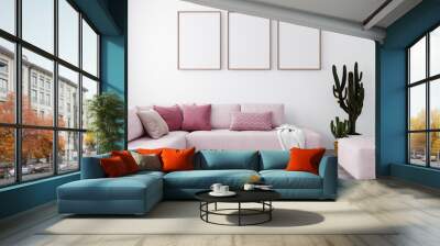 Stylish interior of bright living room with pink sofa and cactus. Living room interior mockup. Modern design room with bright daylight. 3d rendering Wall mural