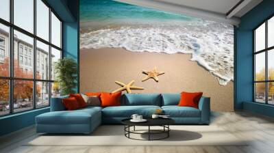 two starfish on a beach Wall mural