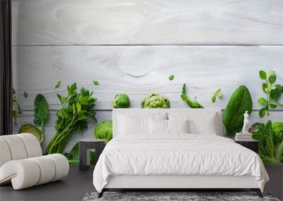 green salad and green ingredients. fresh design concept on a white background. Wall mural