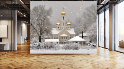 A beautiful Russian church features golden domes, surrounded by a winter forest. Nearby, a house roof is blanketed in fresh snow, creating a serene atmosphere Wall mural