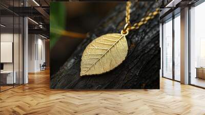 a golden necklace featuring a white stone leaf pendant delicately hanging from a tree branch, isolated against a dark grey background, crafting a scene of timeless sophistication. Wall mural