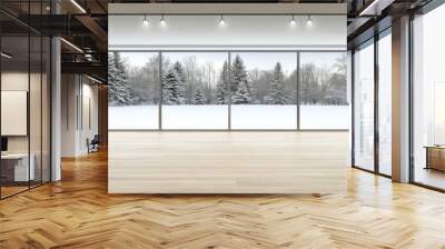 Sunlight creates a warm atmosphere inside the beautiful wooden cabin, where large windows frame a breathtaking view of the snowy forest landscape outside Wall mural