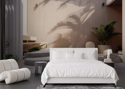 Sunlight streams through a window, casting long shadows on a white wall and wooden floor, illuminating two potted plants in the corner. Wall mural