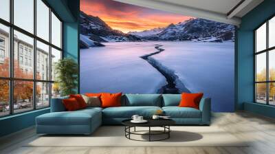 Beautiful winter sunset in the mountains. Wall mural