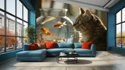 A cat is looking at a fish in a fishbowl Wall mural