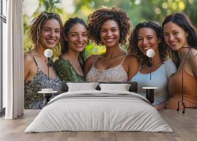 A group of women are smiling and posing for a picture Wall mural