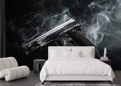 A gun is shown in the air with smoke surrounding it Wall mural