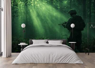 A man in camouflage is standing in a forest with a rifle Wall mural