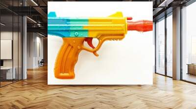 A toy gun with a blue and yellow handle Wall mural