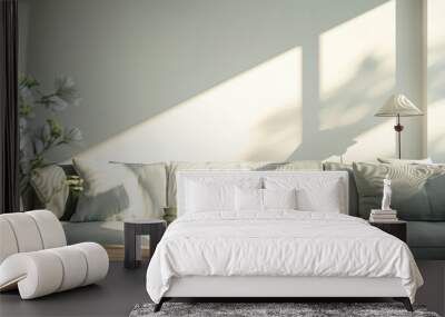 A white couch with a lamp on it and a vase of flowers on the coffee table Wall mural