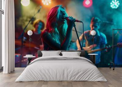 A woman singing in front of a band with smoke in the background Wall mural