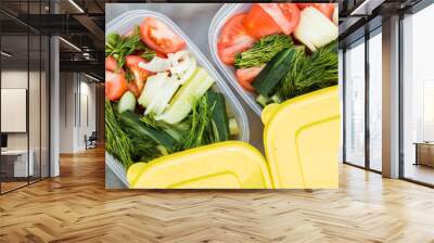 Closeup of delicious fresh raw vegetables from the garden in two containers, top view Wall mural