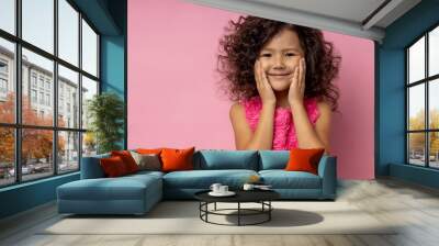 Portrait of a happy little girl Wall mural