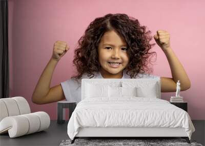 Portrait of a pretty curly little girl Wall mural