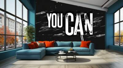 The artwork features the uplifting phrase YOU CAN in bold white letters, set against a textured black background that enhances its motivational message Wall mural