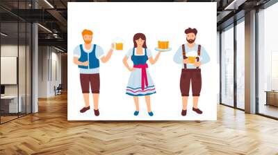 A group of guys and girls in national German costumes are holding glasses of beer. Celebration of Oktoberfest Wall mural