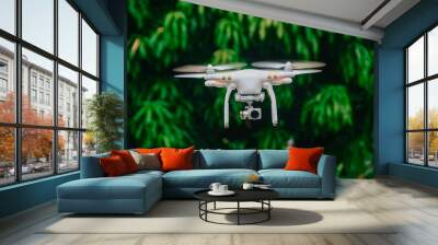 flying drone quadcopter with digital camera, good for article, with a background of trees Wall mural