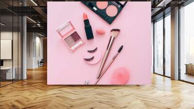 Female accessories for make up on pink background. Beauty concept. Wall mural