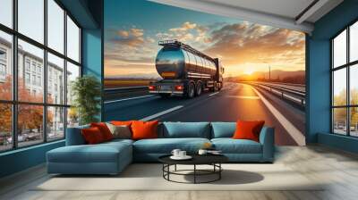 A sunset lit countryside road with a moving large fuel tanker truck Wall mural