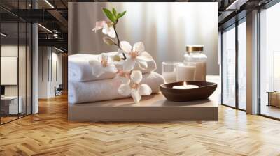 A tranquil spa and wellness environment adorned with blossoming flowers and neatly arranged towels. A heavenly day spa featuring natural products inspired by nature. Wall mural