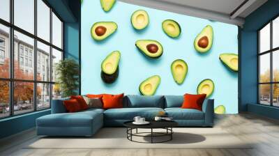 Avocado pop art design on blue background creative summer food concept Wall mural